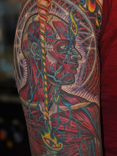 Tattoo of psychedelic figure